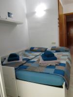Postel nebo postele na pokoji v ubytování BELLA CASA - Helle Wohnung in Strandnähe
