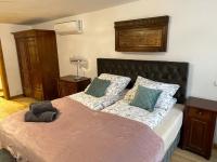 Łóżko lub łóżka w pokoju w obiekcie Mostowa Apartment