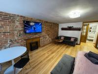 Telewizja i/lub zestaw kina domowego w obiekcie Mostowa Apartment
