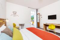 TV a/nebo společenská místnost v ubytování Wellness Hotel Grand
