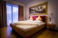 Posteľ alebo postele v izbe v ubytovaní Apartments Dolomit-Royal