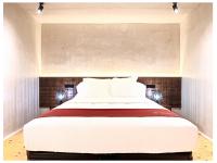 A bed or beds in a room at Casa Palacio Rodrigo de la Fuente by Príncipe David - Seis Apartamentos de Lujo -