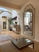 A seating area at Maison del Ducato Cavour 37