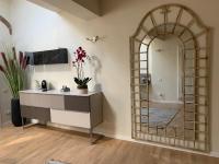 A television and/or entertainment centre at Maison del Ducato Cavour 37