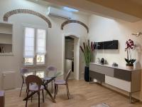 A television and/or entertainment centre at Maison del Ducato Cavour 37