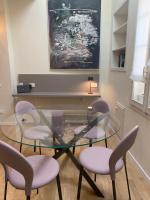 A seating area at Maison del Ducato Cavour 37