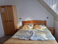Posteľ alebo postele v izbe v ubytovaní Pod Żaglami