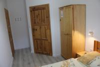 Posteľ alebo postele v izbe v ubytovaní Pod Żaglami