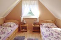Posteľ alebo postele v izbe v ubytovaní Holiday home for 10 people, close to the lake