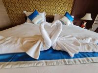 Postel nebo postele na pokoji v ubytování Elegancy Resort Hua Hin