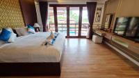 Postel nebo postele na pokoji v ubytování Elegancy Resort Hua Hin