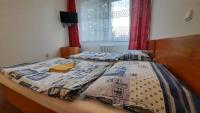 Postel nebo postele na pokoji v ubytování Hotel Kristl