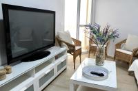 A television and/or entertainment centre at WISH SUITE BASILICA