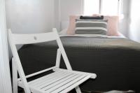 A bed or beds in a room at WISH SUITE BASILICA