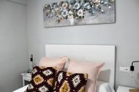 A bed or beds in a room at WISH SUITE BASILICA