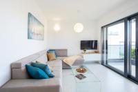 Televízia a/alebo spoločenská miestnosť v ubytovaní Penthouse Adriatic Blue