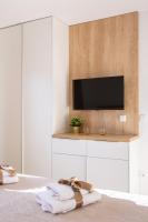 Televízia a/alebo spoločenská miestnosť v ubytovaní Penthouse Adriatic Blue
