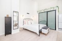 Posteľ alebo postele v izbe v ubytovaní BHost - Loft El Angel