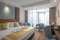 Łóżko lub łóżka w pokoju w obiekcie Willis Hotel Business & Wellness