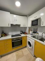 Kuchyň nebo kuchyňský kout v ubytování Apartament CALETA