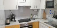 Kuchyň nebo kuchyňský kout v ubytování Apartament CALETA