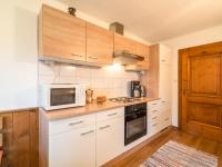 A kitchen or kitchenette at Holiday home in Bad St Leonhard in Carinthia