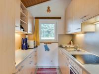 Kuchnia lub aneks kuchenny w obiekcie Spacious Chalet in Maishofen near Forest