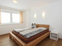 Posteľ alebo postele v izbe v ubytovaní Holiday home Steinfeld close to the ski lift