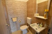 Koupelna v ubytování Emilio Apartment