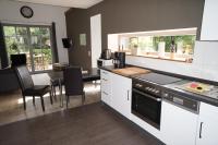 Kuchyň nebo kuchyňský kout v ubytování BluGarden Ferienapartments im Spreewald