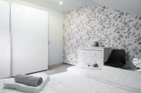 Postel nebo postele na pokoji v ubytování Apartma Tia