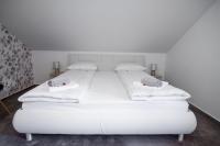Postel nebo postele na pokoji v ubytování Apartma Tia