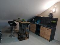 Kuchyň nebo kuchyňský kout v ubytování Apartmani Sunset