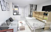 TV a/nebo společenská místnost v ubytování 243 Águila apartamentos - Estudio vista al mar - Piscina y Playa