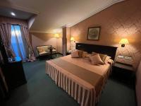A bed or beds in a room at Santiago