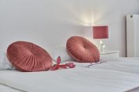 Posteľ alebo postele v izbe v ubytovaní Apartments Dmowskiego Kępa Mieszczańska by Noclegi Renters