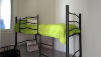 Postel nebo postele na pokoji v ubytování VivaBien Playa I - Apartamentos junto al mar