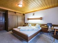 Łóżko lub łóżka w pokoju w obiekcie Apartment in Saalbach-Hinterglemm near ski area