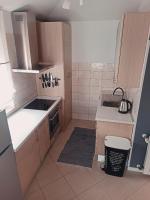 Kuchyň nebo kuchyňský kout v ubytování Apartment Gaia
