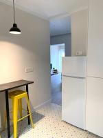 A kitchen or kitchenette at Xuloss Apartments 2