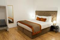 Posteľ alebo postele v izbe v ubytovaní Home at Rome Vatican Apartment&Rooms