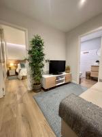 TV a/nebo společenská místnost v ubytování Suite Centro Pontevedra