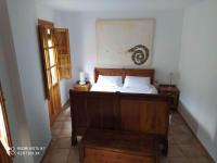 A bed or beds in a room at casa sobre rio Noguera Pallaresa