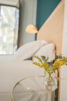 A bed or beds in a room at Casa de la Romanilla