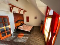 Posteľ alebo postele v izbe v ubytovaní Hellasz Apartman
