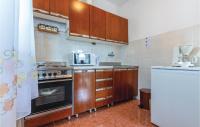Kuchyňa alebo kuchynka v ubytovaní Apartment Okrug Donji Osoje