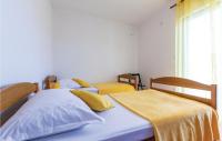 Posteľ alebo postele v izbe v ubytovaní Apartment Okrug Donji Osoje