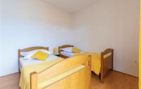 Posteľ alebo postele v izbe v ubytovaní Apartment Okrug Donji Osoje