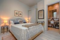 Posteľ alebo postele v izbe v ubytovaní Heraclea Residential Apartments