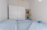 Posteľ alebo postele v izbe v ubytovaní One-Bedroom Apartment In Porec